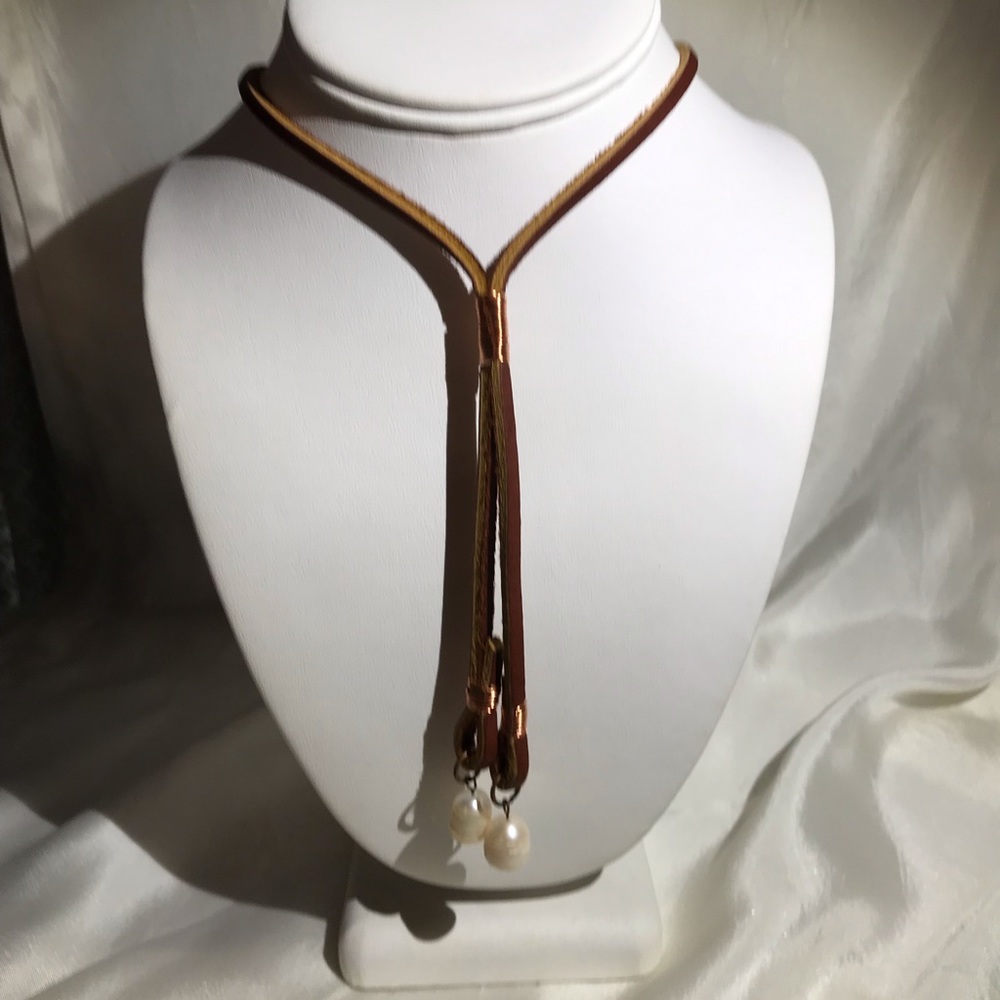 Suede leather Lariat style necklace.